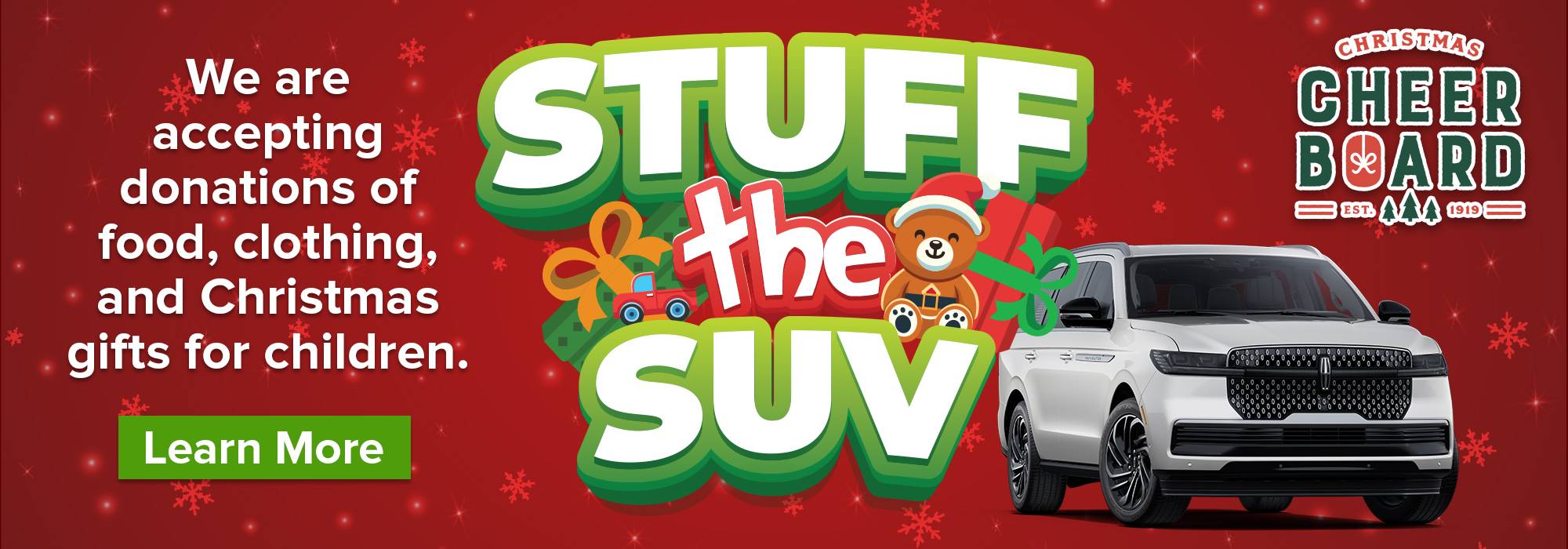"Stuff the SUV" donation drive banner with teddy, gift, and SUV. Accepting food, clothing, and Christmas items.