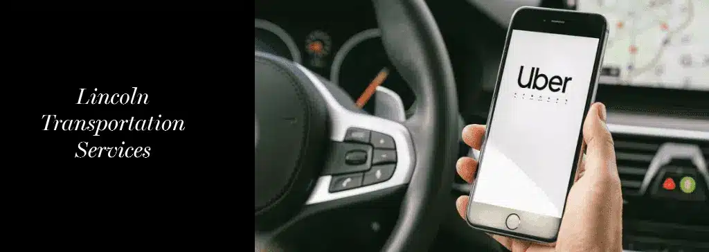 Hand holding smartphone with Uber app in car, steering wheel visible; text: "Lincoln Transportation Services."
