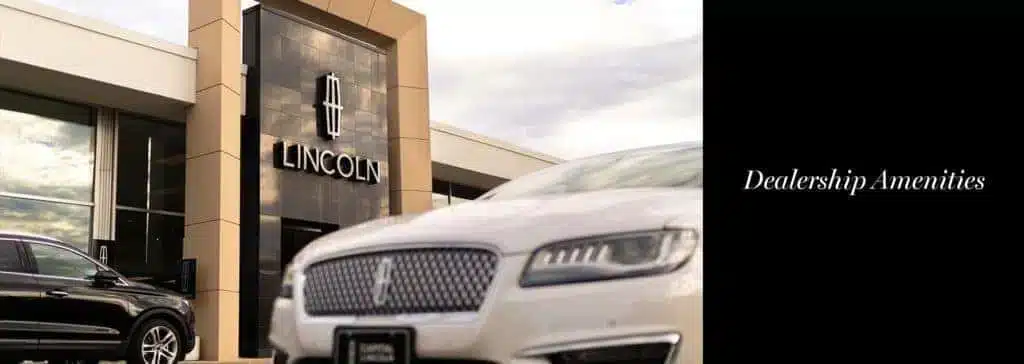 Lincoln dealership entrance with cars parked, featuring "Dealership Amenities" text.